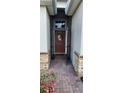 Inviting front entrance with a decorative wreath and stone accents at 3998 Bedford Ave, Winter Haven, FL 33884