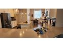 Modern kitchen with quartz countertops, stainless steel appliances, and a spacious island at 3998 Bedford Ave, Winter Haven, FL 33884