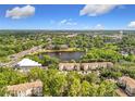 Beautiful aerial shot of the property showcasing the lake and verdant landscape at 960 Mooring Ave # 202, Altamonte Springs, FL 32714