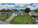 A residential home featuring a well-kept lawn and landscaping, in a Gathering-friendly neighborhood at 119 Ridgecrest Dr, Eustis, FL 32726