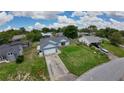 A lovely single-Gathering home with a spacious, well-maintained lawn in a quiet residential neighborhood at 119 Ridgecrest Dr, Eustis, FL 32726