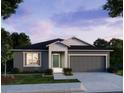 Charming single-story home with a modern color scheme, landscaped front yard, and an attached two-car garage at 3238 Viceroy Ct, Poinciana, FL 34759