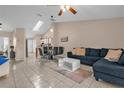 Open-concept layout showcases the seamless flow between living and dining areas at 543 Azinger Cir, Orlando, FL 32824