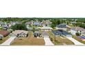 Residential neighborhood featuring well-kept single-Gathering homes, green lawns, and community landscaping at 15 Sawfish Ln, Kissimmee, FL 34759