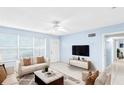 Bright living room with modern decor and ample natural light at 604 S Oxalis Ave, Orlando, FL 32807