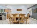 Bright dining area showcasing tile floors, and view of the backyard and dining area at 105 Elizabeth Ave, Altamonte Springs, FL 32701