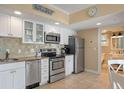 Updated kitchen with stainless steel appliances, and sleek countertops at 611 S Atlantic Ave # 4212, New Smyrna Beach, FL 32169