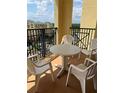 Balcony with outdoor seating and views of the community at 8101 Resort Village Dr # 3909, Orlando, FL 32821