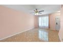 Bright living room with tile floors, neutral walls and large window at 130 Kristi Ann Ct, Winter Springs, FL 32708