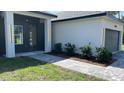 Charming single-story home boasts modern architecture, neat landscaping, and a welcoming entrance at 17380 Sw 36Th Ave Rd, Ocala, FL 34473