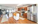 Spacious kitchen with stainless steel appliances and an island at 1993 Excalibur Dr, Orlando, FL 32822