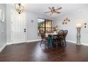 Dining room with a dining table set with chairs and a ceiling fan at 2739 Village Pine Ter, Orlando, FL 32833