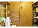 Well-organized storage area with shelving and a pegboard for tools and equipment at 367 Par Pines Blvd, Davenport, FL 33837