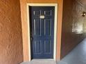 Front door with unit number 1423 in a hallway at 5160 Conroy Rd # 1423, Orlando, FL 32811