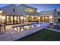 Inviting backyard with a sparkling pool, lounge chairs, and seamless access from the house at 9364 Thurloe Pl, Orlando, FL 32827