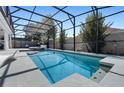 Relaxing screened-in pool area with sparkling blue water and ample space for lounging at 11407 Wakeworth St, Orlando, FL 32836
