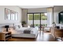 Serene main bedroom with outdoor access and stylish furniture at 2612 Musselwhite Ave, Orlando, FL 32804