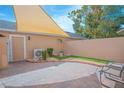 Private brick patio with turf and shade at 9635 Fenrose Ter, Orlando, FL 32827