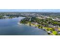 Scenic aerial view of a waterfront community nestled along the tranquil lake at 101 E Lauren Ct, Fern Park, FL 32730