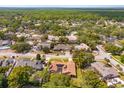 Spacious property with lush greenery and surrounding neighborhood landscape at 413 Sandy Hill Dr, Longwood, FL 32779
