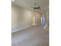 Spacious living room with neutral carpet and recessed lighting offers a versatile layout at 4224 Sagefield Dr, Harmony, FL 34773