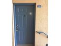 Blue apartment front door with metal hardware and a welcome mat at 495 Las Cortes Ln # 206, Orlando, FL 32824