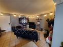 Cozy living room with tile floors, featuring unique decor, and ample space for relaxation and entertainment at 131 Water Front Way # 200, Altamonte Springs, FL 32701