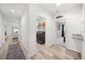 Hallway view to laundry room, storage and view to living room at 849 Avenal Ln, Davenport, FL 33837