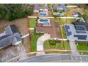 Aerial view of property showcasing pool, landscaping, and circular driveway, all within a defined property line at 275 Tollgate Trl, Longwood, FL 32750