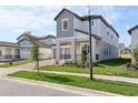 Desirable home featuring brick driveway and manicured lawn at 5242 Citrus Leaf, Winter Garden, FL 34787
