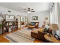 Spacious living room featuring hardwood floors, stylish furnishings, and natural light at 1121 Magnolia Ave, Daytona Beach, FL 32114