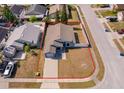 Aerial view of the property highlighting the layout, boundaries, and surrounding neighborhood at 2164 Rj Cir, Kissimmee, FL 34744
