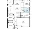 Detailed floor plan showcasing the layout of the home, including the bedrooms, kitchen, and garage at 2703 Ravencliffe Ter, Oviedo, FL 32765