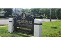 Capistrano Condominiums clubhouse signage in landscaped entrance area at 200 Maitland Ave # 232, Altamonte Springs, FL 32701