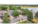 Bird's-eye view of neighborhood showcasing a two-story home with landscaped yard at 2116 Truffle Ln, Casselberry, FL 32707