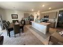 Open-concept living room that seamlessly connects to the kitchen, creating a perfect space at 2711 Neverland Dr, New Smyrna Beach, FL 32168