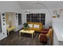 Cozy living room filled with natural light, featuring hardwood floors and neutral decor at 8973 Lee Vista Blvd # 2308, Orlando, FL 32829