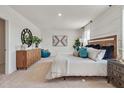 Spacious bedroom featuring neutral tones, soft carpet, and ample natural light at 3850 Royal Azalea Way, Sanford, FL 32773