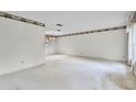 A well-lit living room featuring carpet floors at 715 Roughbeard Rd, Winter Park, FL 32792