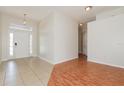Inviting foyer with tile and wood flooring, offering a warm welcome at 1653 Turtle Rock Dr, Lakeland, FL 33803