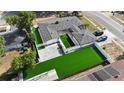 Stunning aerial view of home featuring a courtyard, backyard artificial turf, and a brick paved driveway at 2803 Tech Dr, Orlando, FL 32817