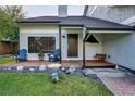 Charming front porch with wooden deck, seating, and manicured landscaping at 302 Hermits Trl, Altamonte Springs, FL 32701