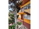 Inviting two-story apartment building with colorful exterior and secure entryways at 710 Ridenhour Cir # 710, Orlando, FL 32809