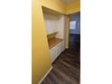 A cozy kitchen with white cabinets and ample storage space at 710 Ridenhour Cir # 710, Orlando, FL 32809