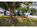 Charming single-story home with well-maintained landscaping and mature trees at 10108 Matchlock Dr, Orlando, FL 32821