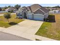 Beautiful single-story home with a two-car garage, stone accents, and a spacious driveway at 1816 Forest Glen Dr, Fruitland Park, FL 34731