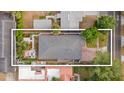 An aerial view of the home highlighting the roof, backyard, and surrounding neighborhood at 2602 Winter Park Rd, Winter Park, FL 32789