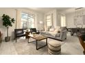 Bright living room with modern furniture, large windows overlooking pool, and stylish decor at 3009 Penelope Loop, Kissimmee, FL 34746