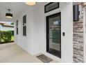 The beautiful front entrance leads guests to this home's stylish front door at 4509 Patricia Ann Ct, Orlando, FL 32839