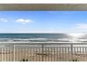 Breathtaking ocean views from this inviting condo balcony at 5301 S Atlantic Ave # 51, New Smyrna Beach, FL 32169